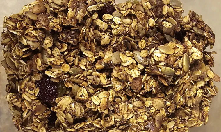 Finished lemon chia granola in a glass jar