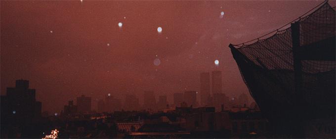 Rain over the skyline at night, 2001
